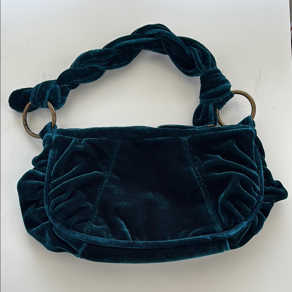 luxurious velvet handbag in deep green